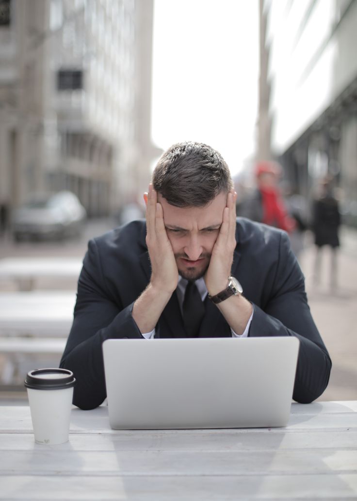 A man stressed over a denied application